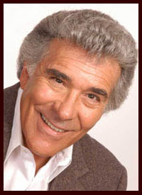 head shot of gray haired male singer