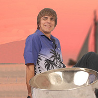 male singer on beach with steel drum