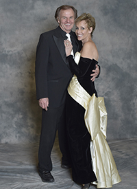 sophisticated couple in semi-formal dress portrait